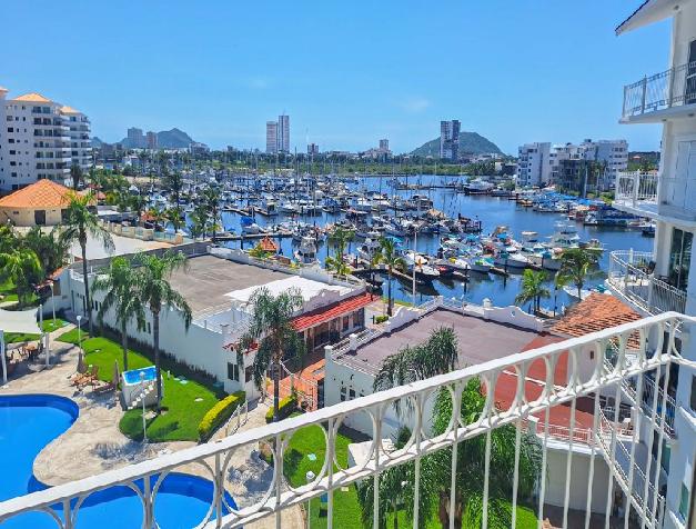 Turn Key Marina Front Condo at PUESTA DEL SOL